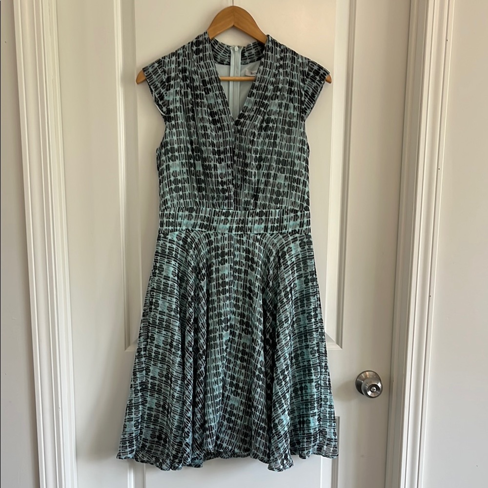 Ricki’s sheer fit and flare print dress size 6